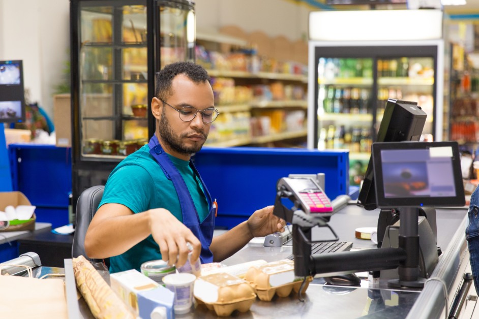 Cashier Sitting Performing Modified Work